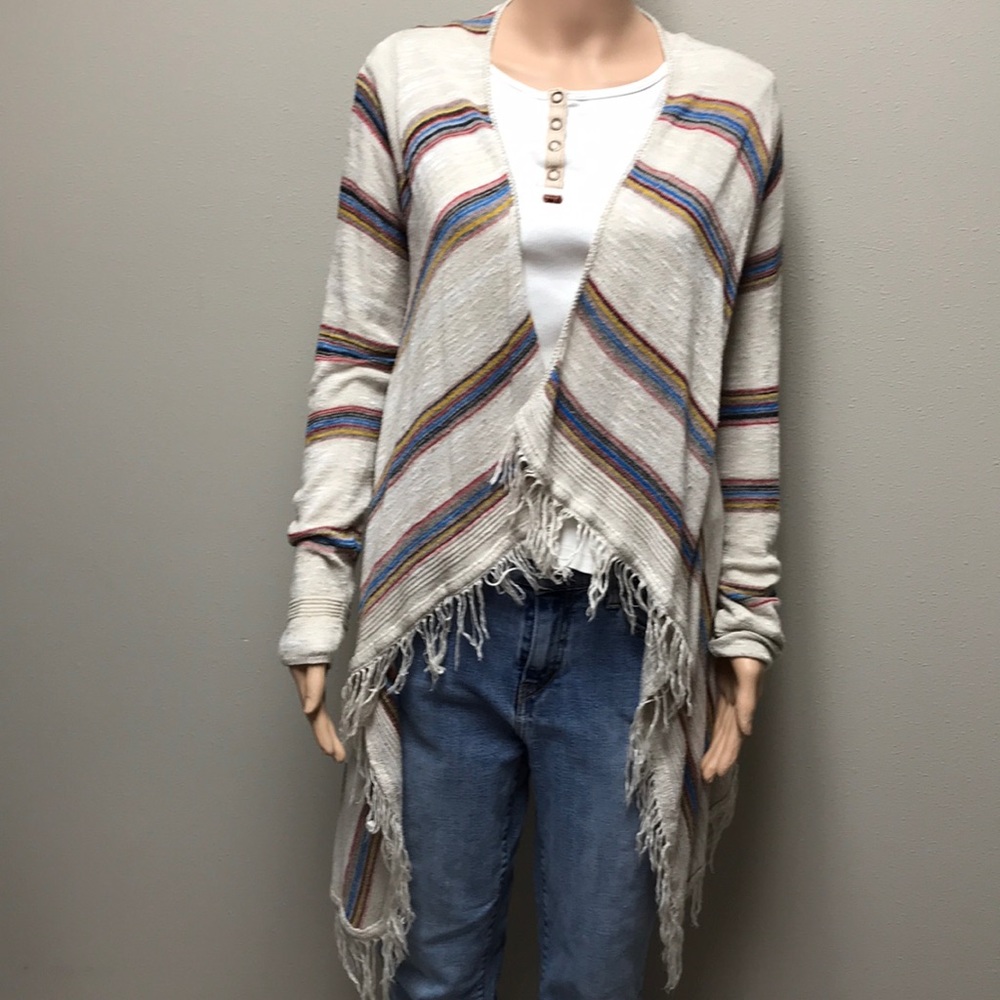 Poncho style cardigan with fringe trim